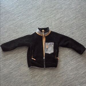 Patagonia Black Fleece Jacket with Tan and Gray Details